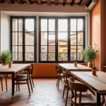 주거 혁신을 위한 협업 공간의 중요성 - **Prompt:** A vibrant, sun-drenched co-living and co-working common area within a beautifully renova...